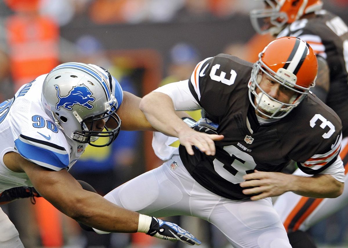 2013-1013-Ndamukong-Suh-Brandon-Weeden.jpg